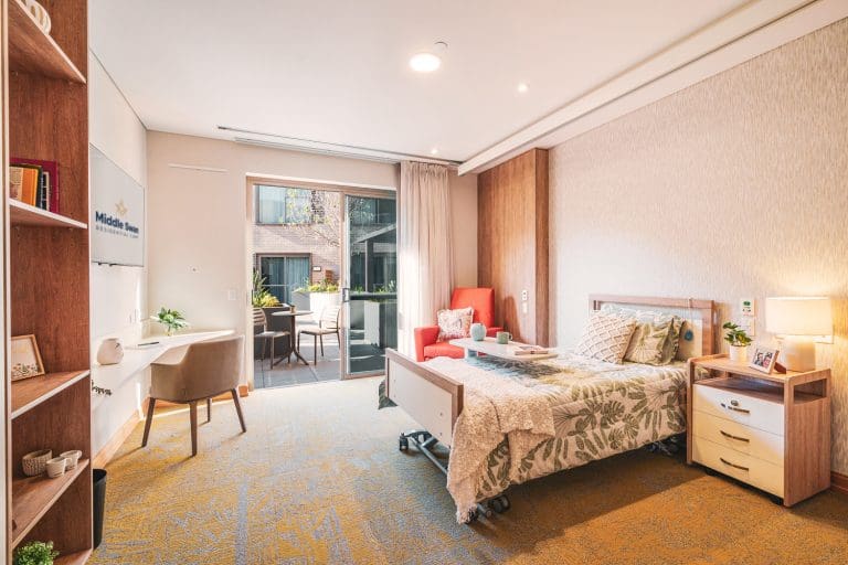 Aged care suite shown in bed + courtyard configuration
